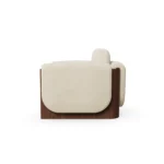 Noah armchair by Nolita Harbour, sculptural lounge chair with rounded upholstery and refined wooden frame.