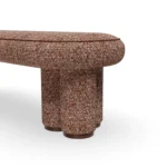 Vionne upholstered bench by Nolita Harbour, textured fabric bench with soft curves and bold cylindrical legs.