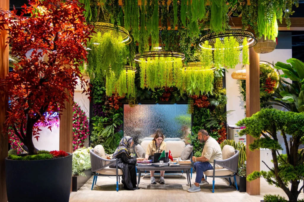 Biophilic lounge setting presented at INDEX Saudi 2026, featuring lush greenery and sustainable design concepts redefining contemporary Middle East interior design.