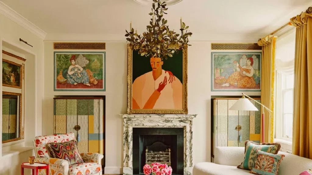 Layered neutral London townhouse interior by Studio Ashby featuring a sculptural bouclé sofa, curated vintage furnishings, marble fireplace, contemporary art, and tactile material detailing that showcases texture in modern interiors with refined, collected elegance.