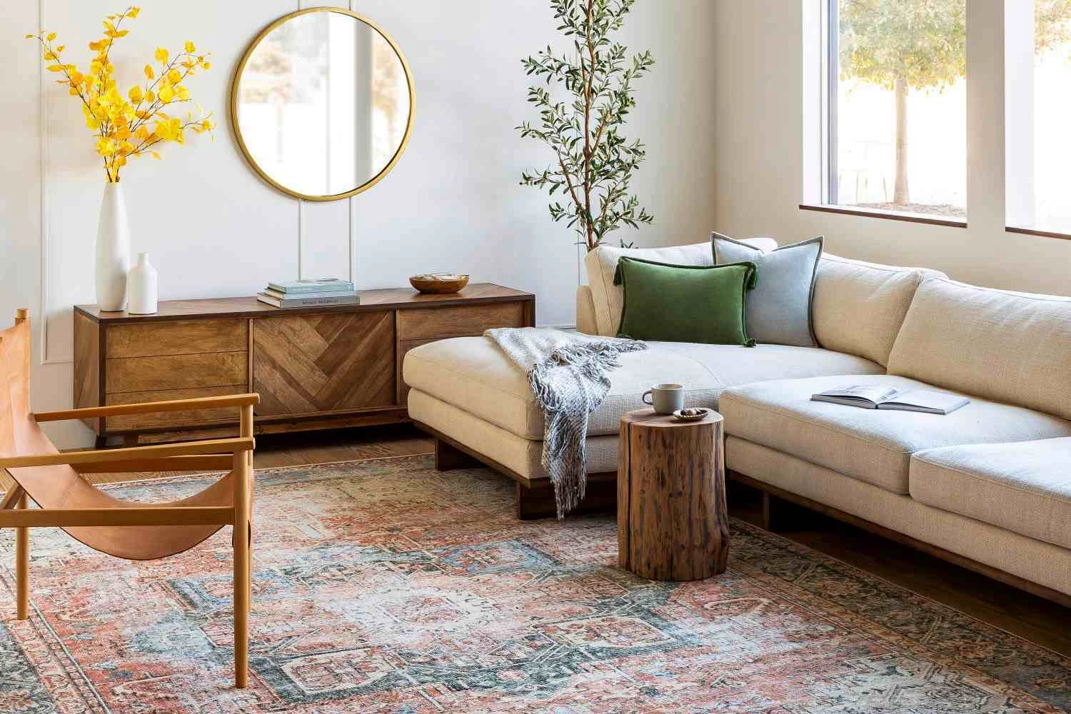 Spacious luxury living rooms featuring elegant sectional sofas thoughtfully positioned to balance scale and circulation, with refined materials, layered seating, and abundant natural light enhancing sophisticated open-plan layouts.