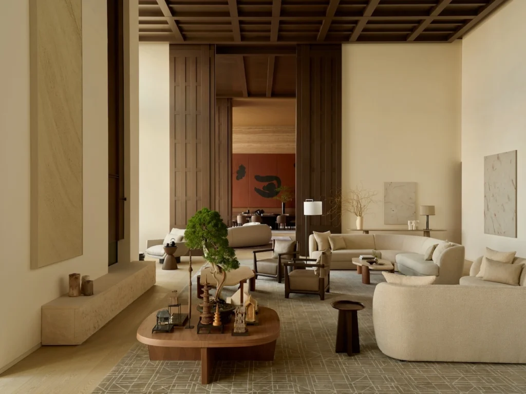 Luxury interiors by Yabu Pushelberg showcasing layered seating design—from intimate lounge clusters and sculptural living room arrangements to refined hospitality spaces—highlighting contemporary seating layouts, rich material contrasts, and sophisticated luxury living room seating compositions.