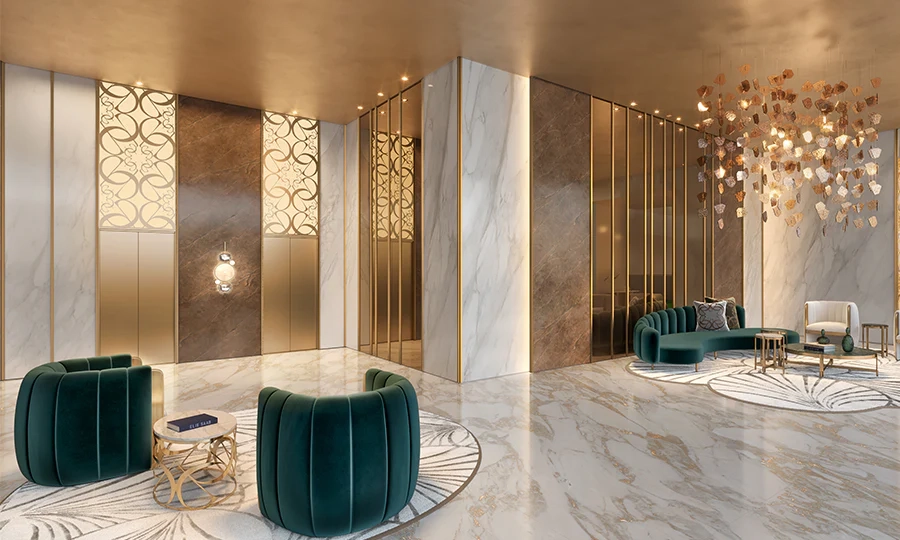 Luxurious lobby with marble floors, plush green chairs, and gold accents. Elegant chandelier adds warmth, with patterned walls enhancing sophistication.
