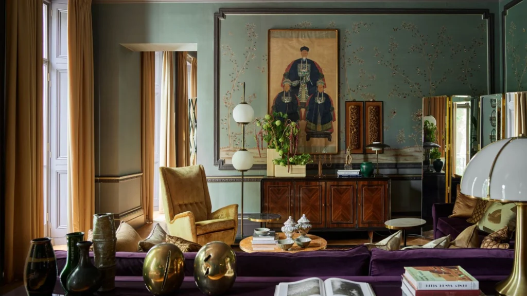 Dimore Studio atmospheric interior design with maximalist layered luxury interiors, velvet furniture, vintage lighting and moody Milanese aesthetic