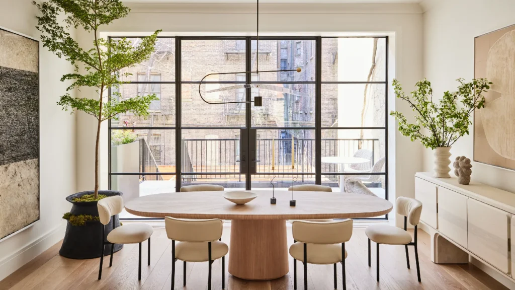 Axel Vervoordt minimalist luxury interiors featuring neutral interiors, textured plaster walls, natural stone floors, reclaimed wood, linen furnishings, and serene wabi-sabi inspired architectural spaces filled with soft natural light.