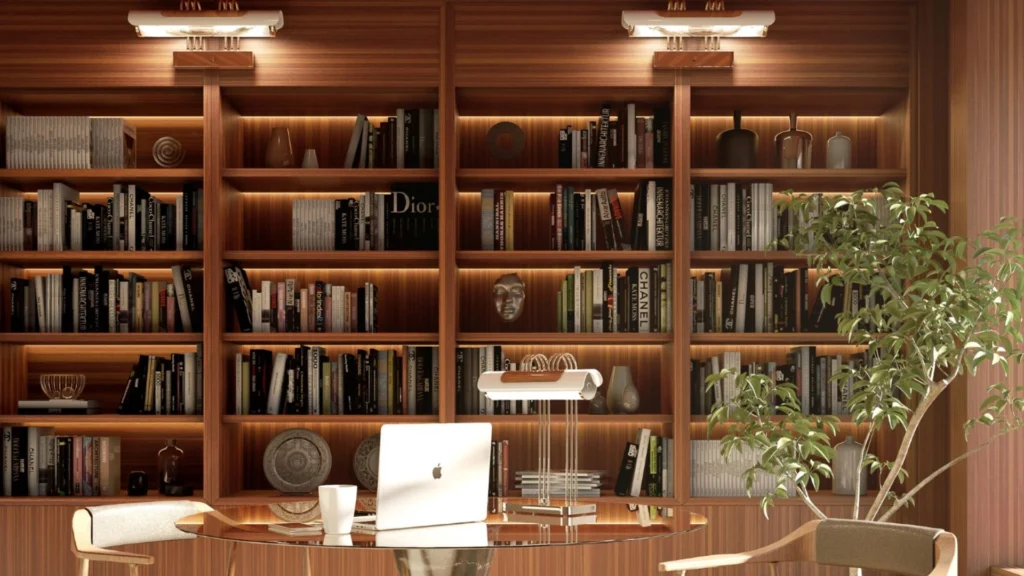Luxury home library design with floor-to-ceiling bookshelves, a comfortable reading chair, and a marble side table creating an elegant reading corner layout.