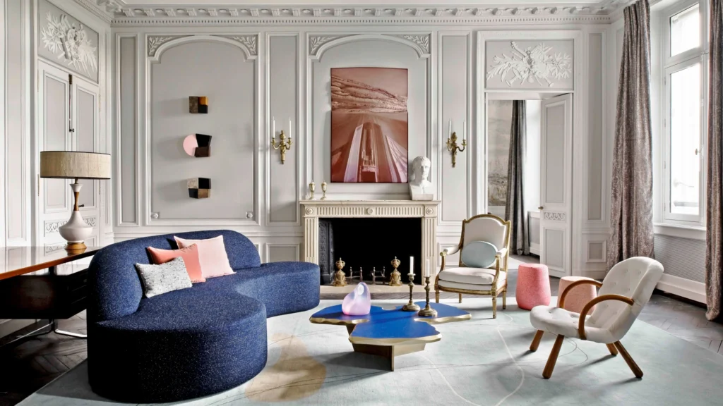 Jean-Louis Deniot layered luxury interior featuring Parisian classical architecture, neutral palette, sculptural furniture, and elegant contemporary design.