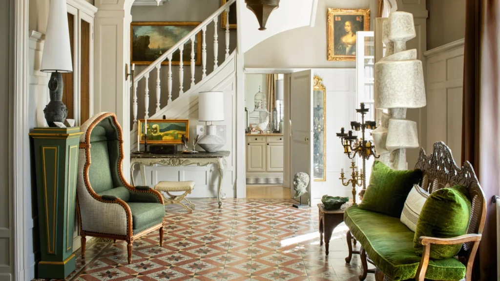 Jean-Louis Deniot layered luxury interior featuring Parisian classical architecture, neutral palette, sculptural furniture, and elegant contemporary design.