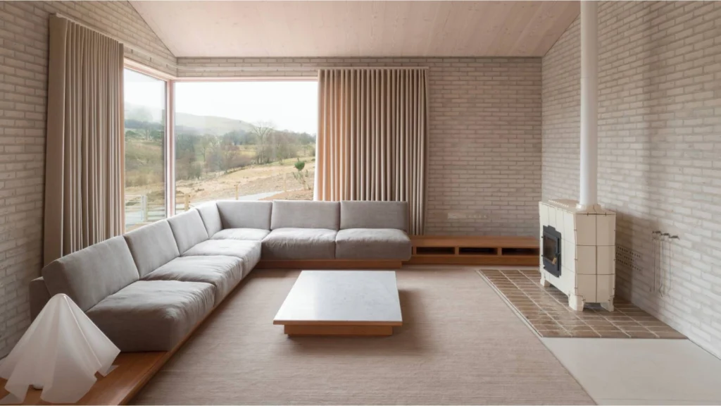 Serene minimalist interiors inspired by John Pawson featuring natural materials, architectural light, and calm contemporary spatial design.