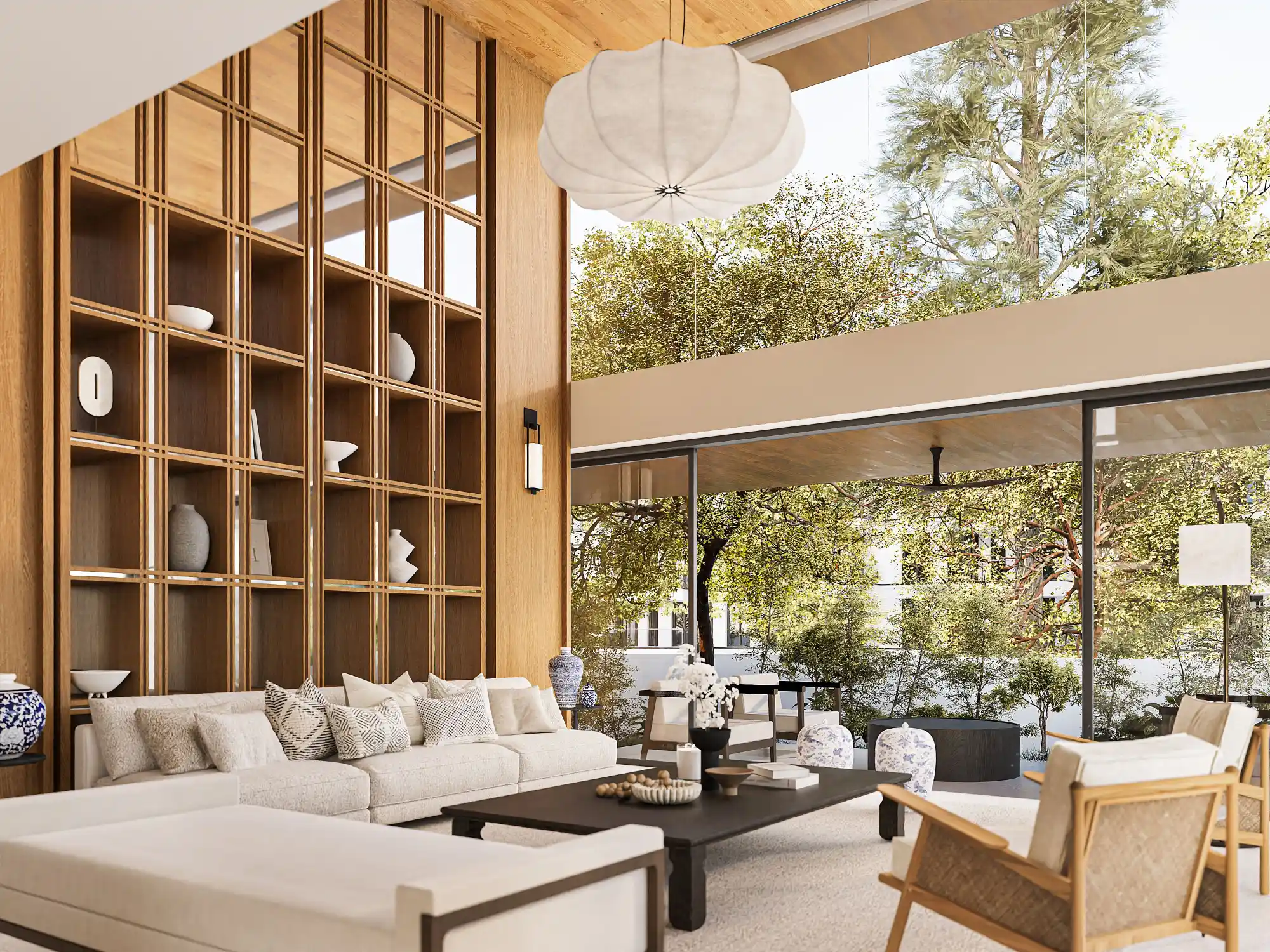 Luxurious living room with floor-to-ceiling windows offering a forest view. Features a spacious beige sofa, wooden shelves with decorative vases, and a large central table. Soft, natural light creates a serene atmosphere, found in modern Singapore residences.