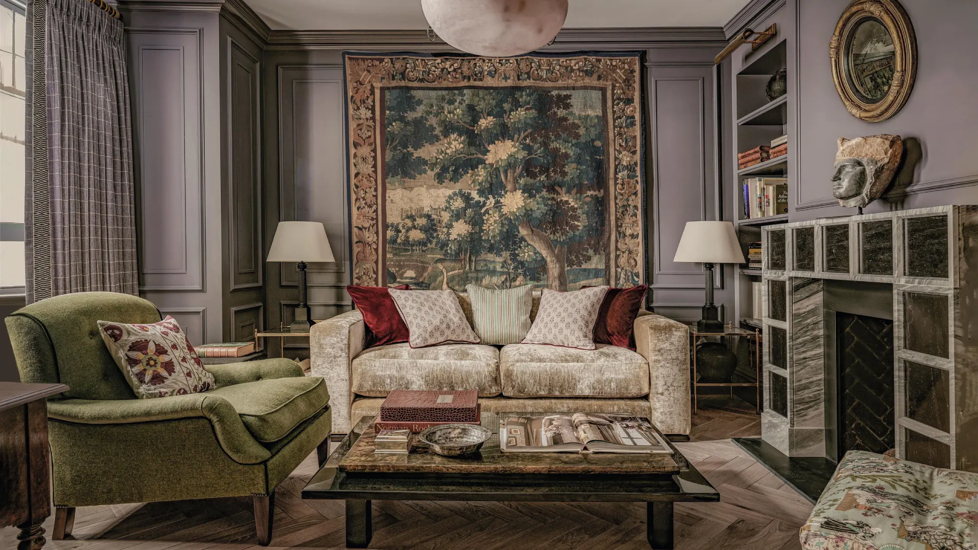 Elegant Notting Hill townhouse living room with a sofa placed between tall French doors, showcasing refined London period home interior design with natural light and garden views.