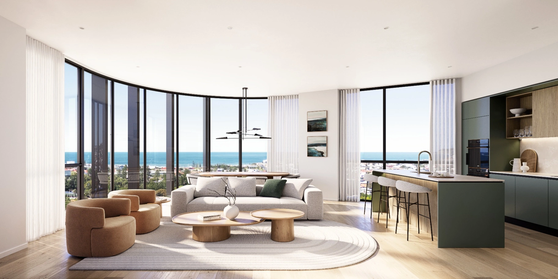 Modern living room with ocean views through large windows. Features a gray sofa, round wooden tables, and cushioned armchairs. Open kitchen with bar stools and sleek design. Bright and airy atmosphere.