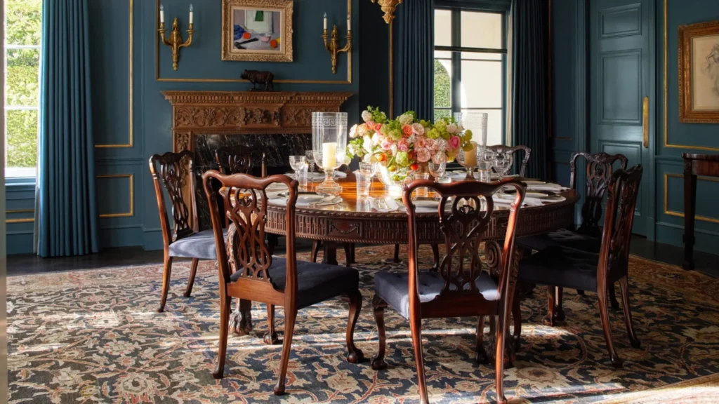 Elegant traditional interiors inspired by Rita Konig featuring classic interior design, layered textiles, antique furniture, warm lighting, and timeless British-style living spaces.