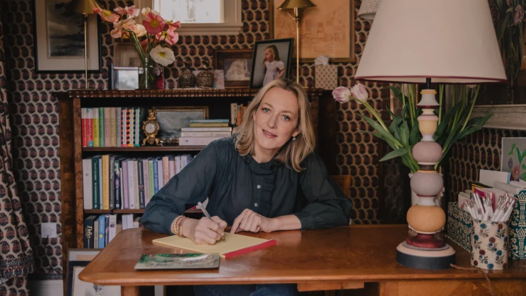 Elegant traditional interiors inspired by Rita Konig featuring classic interior design, layered textiles, antique furniture, warm lighting, and timeless British-style living spaces.