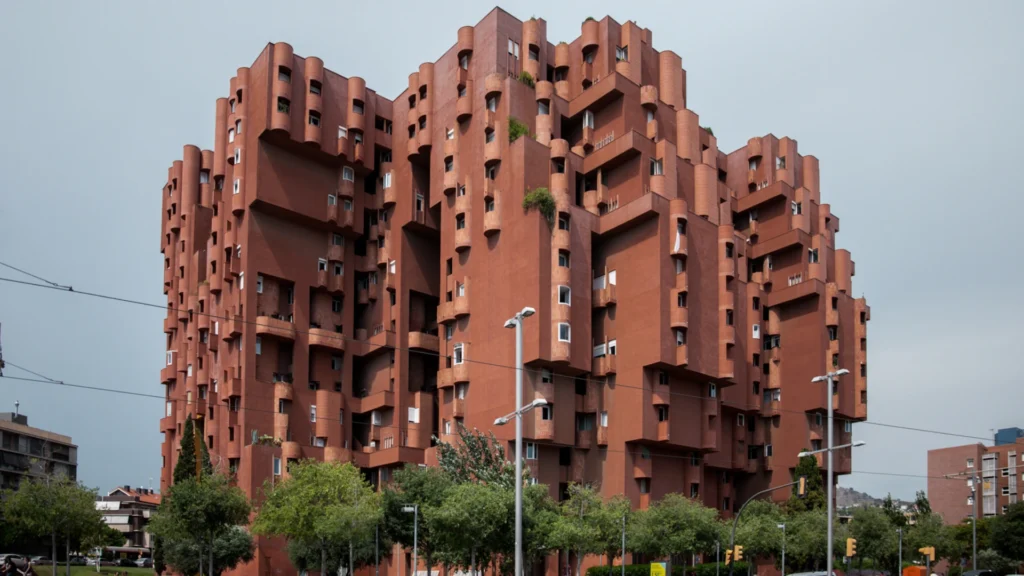 Walden 7 residential complex by Ricardo Bofill in Barcelona, a landmark of postmodern residential architecture featuring terracotta towers and vibrant interior courtyards.