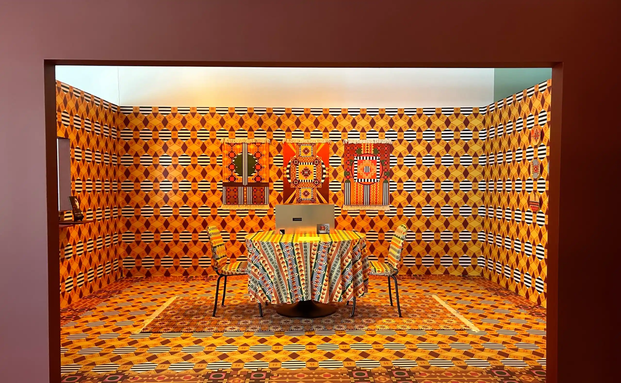 Modern exhibition opening featuring architectural layout, curated display structures, and integrated lighting, representing luxury design fairs and immersive design experiences