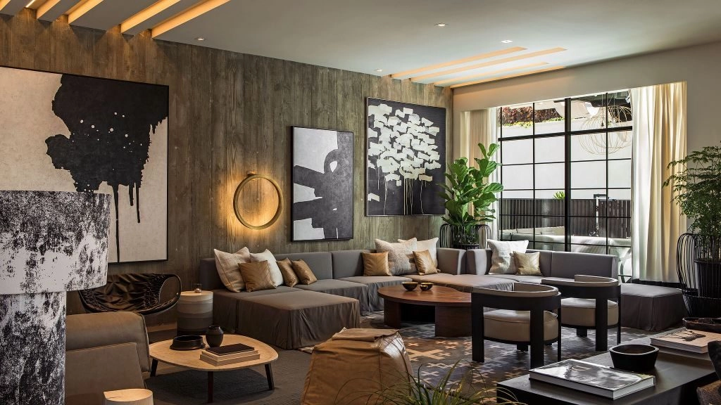 Design-conscious travelers exploring premium hospitality spaces featured in a Luxury Travel Guide.