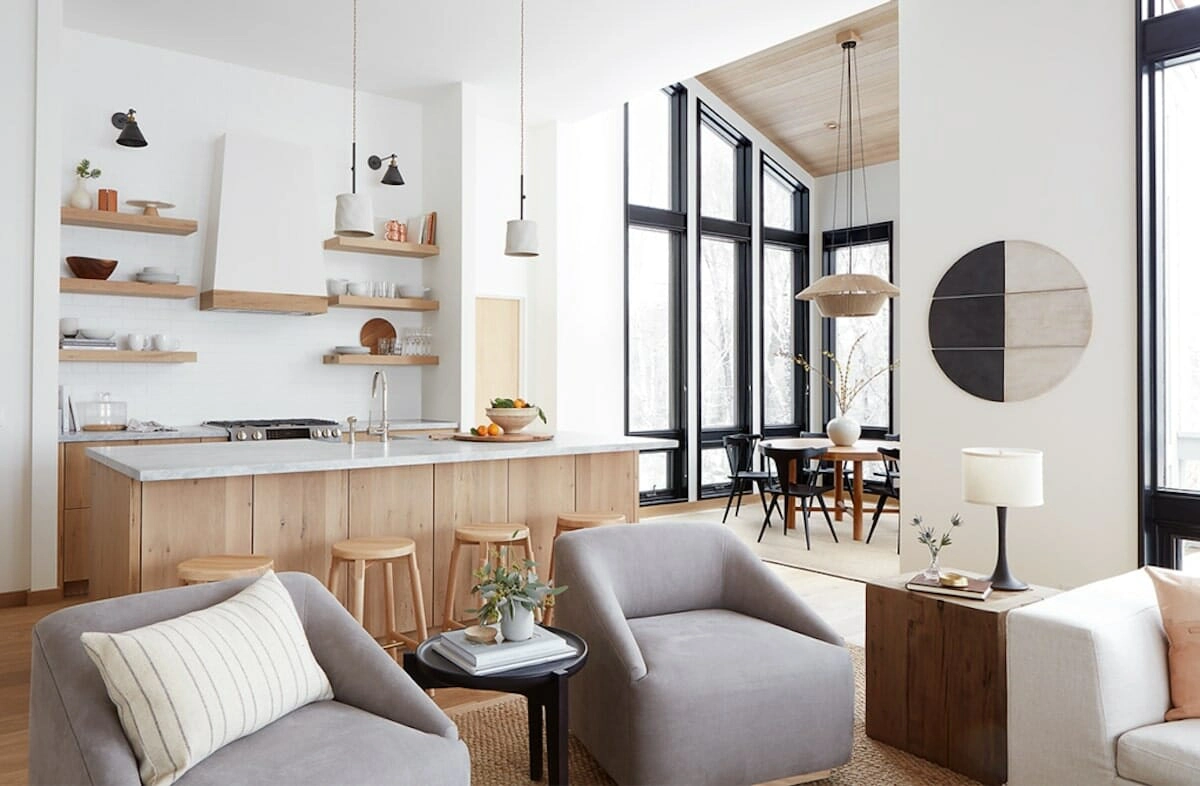 Interior trends 2026 experiential space with open-plan layout, natural light, and seamless spatial flow creating a human-centered and immersive interior environment.