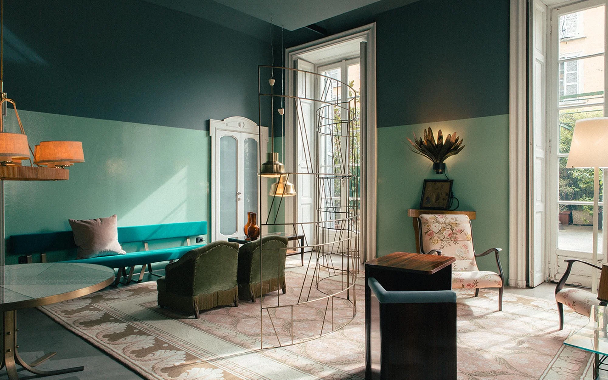 green Dimore Studio design with spaced out furniture, to give a sense of space.