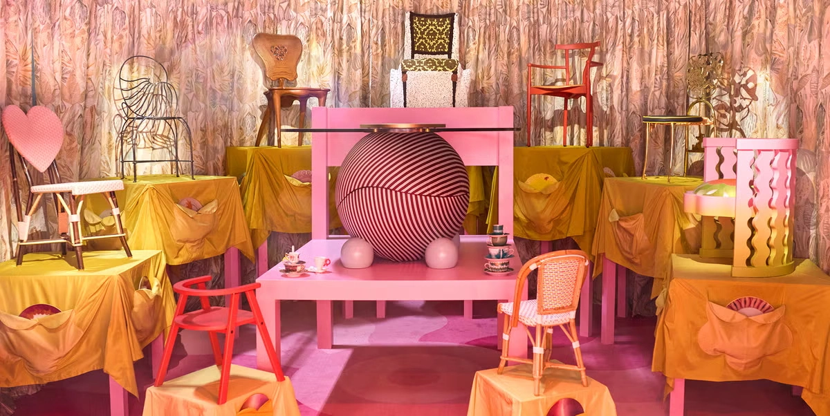 Maison & Objet display of a interior design set of a bright pink and yellow combo