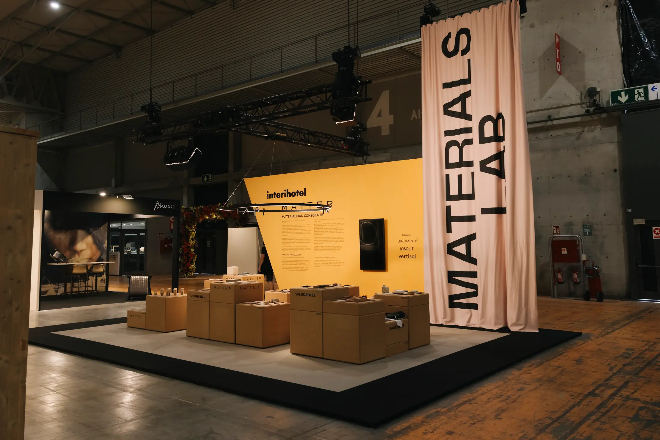 Materials Lab showcase displaying technical surfaces and eco-friendly textiles at Interihotel
