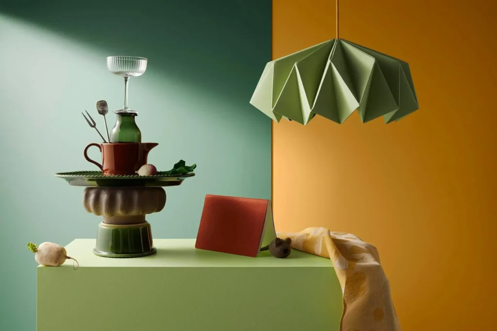 Exhibition table at the Formex fair, showcasing colorful decor and contemporary craftsmanship."